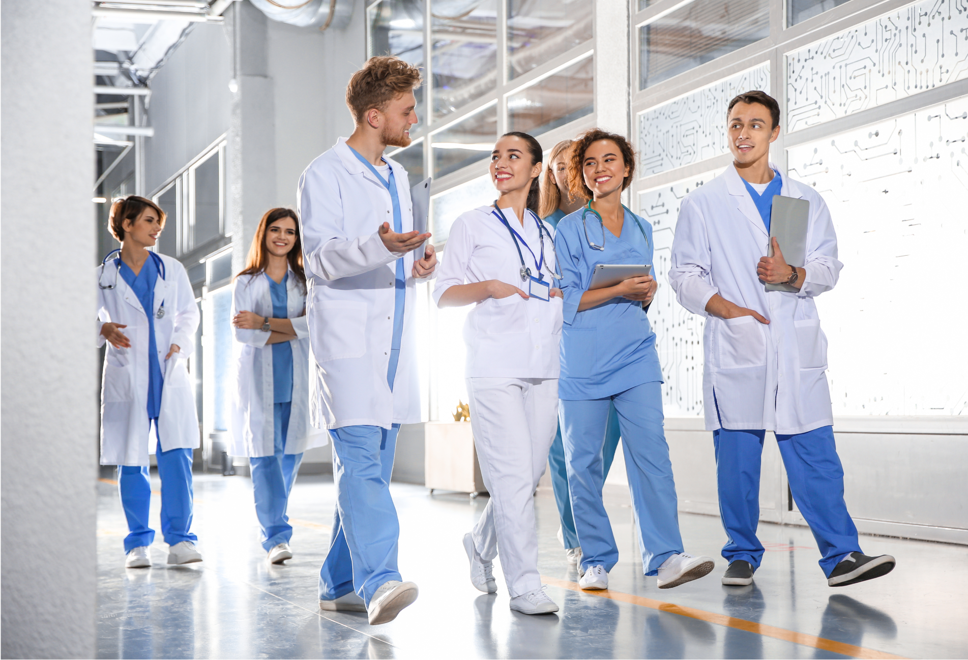 doctors conversing while walking