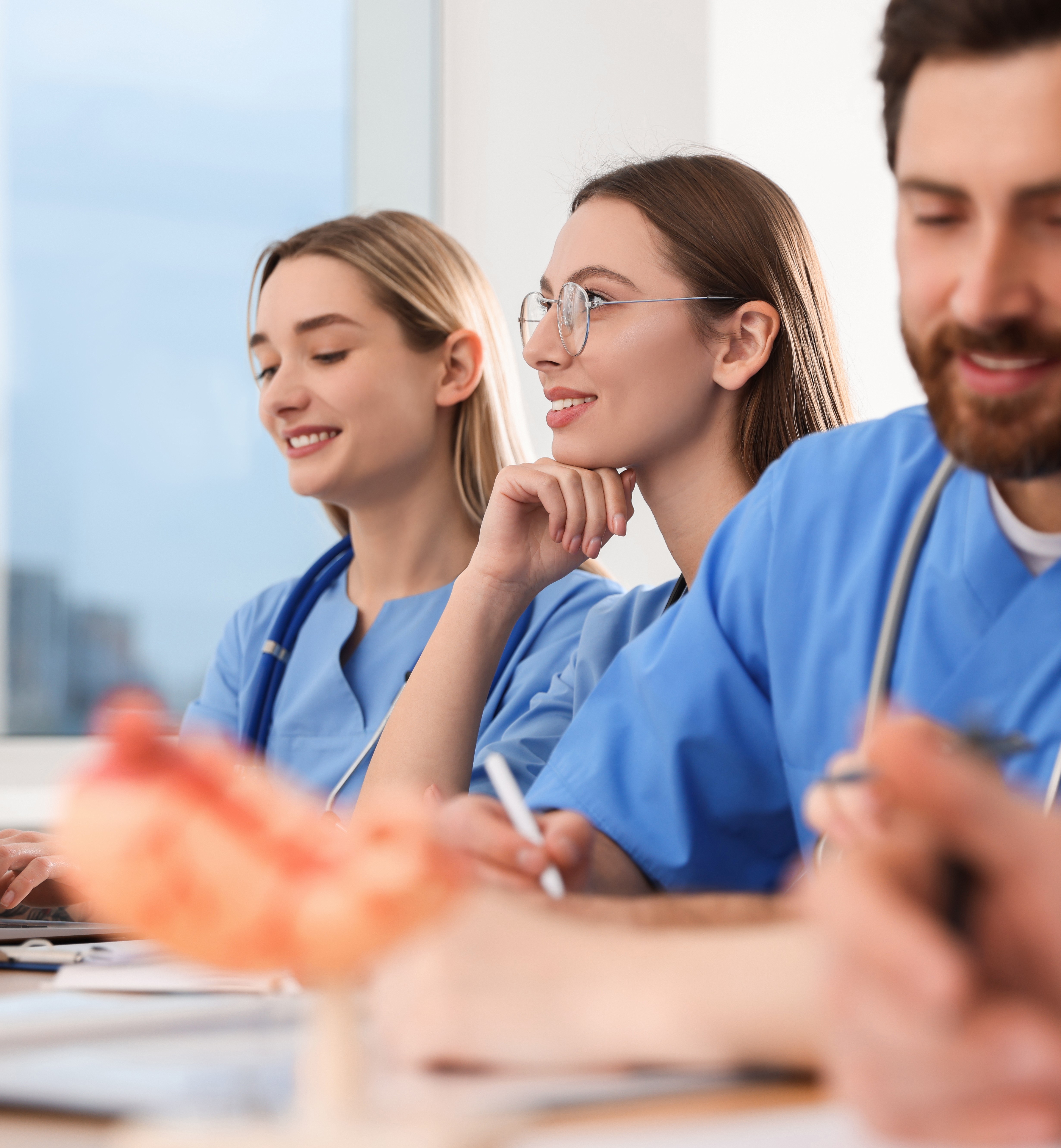 Medical students collaborating in class